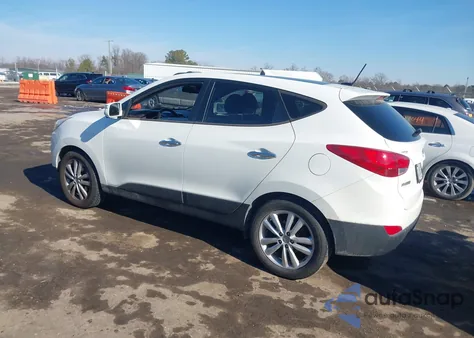 2010 Hyundai Tucson Limited z USA, uszkodzony, nr VIN KM8JUCAC6AU023730